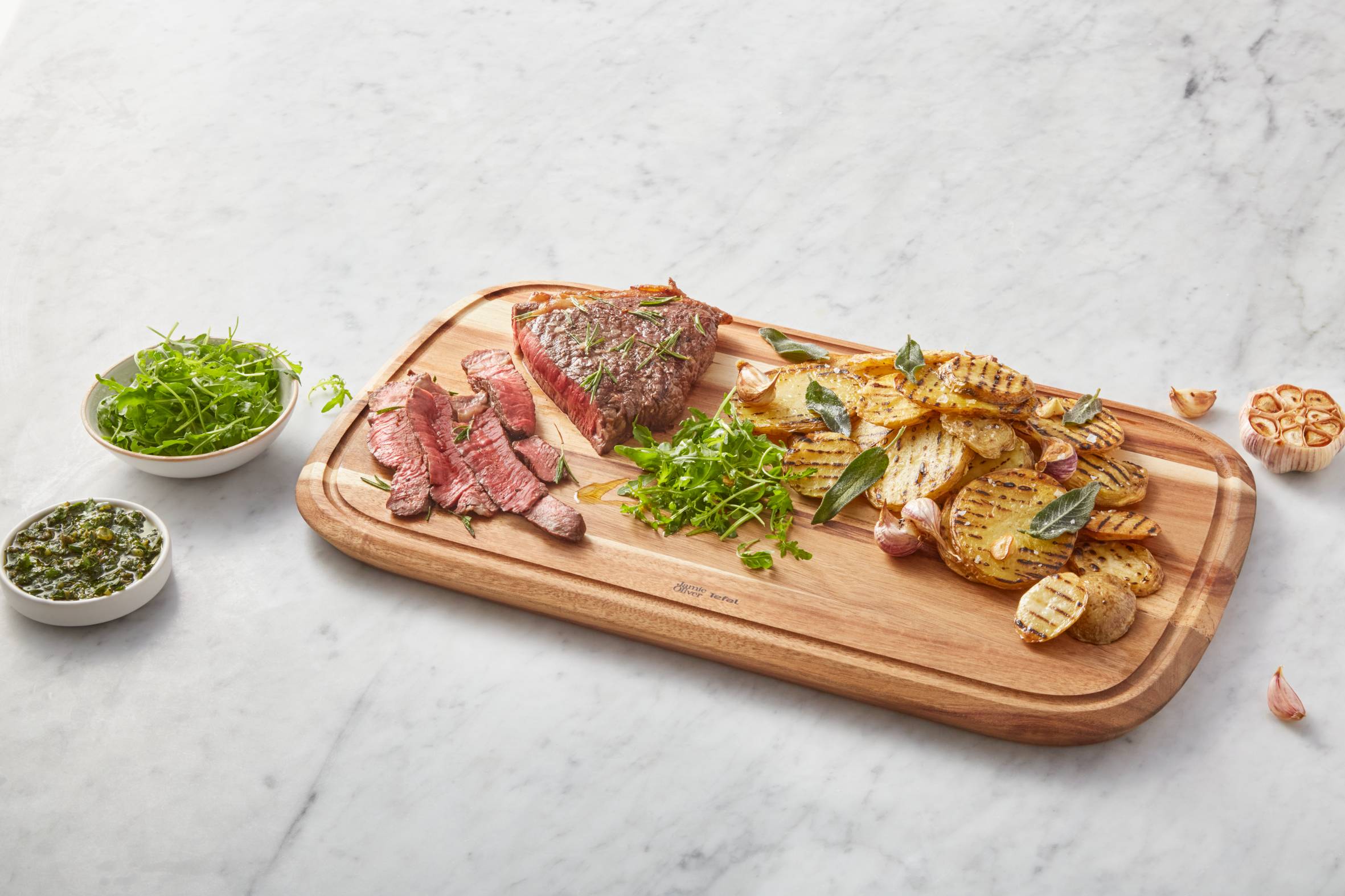 Dřevěná krájecí deska z akácie Tefal Jamie Oliver K2681055 49x28 cm